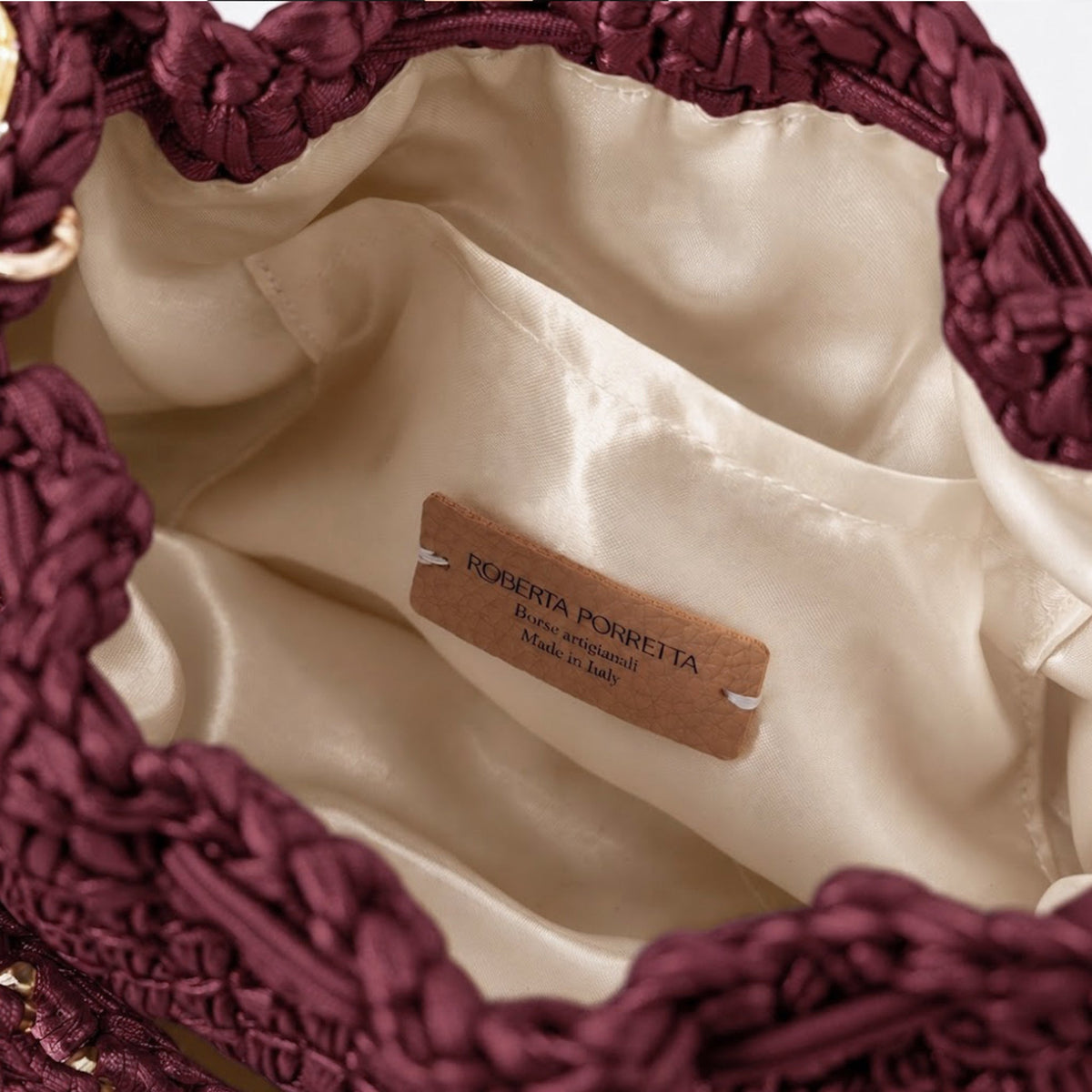HALO PLUM — CONVERTIBLE HANDBAG - Roberta Porretta
